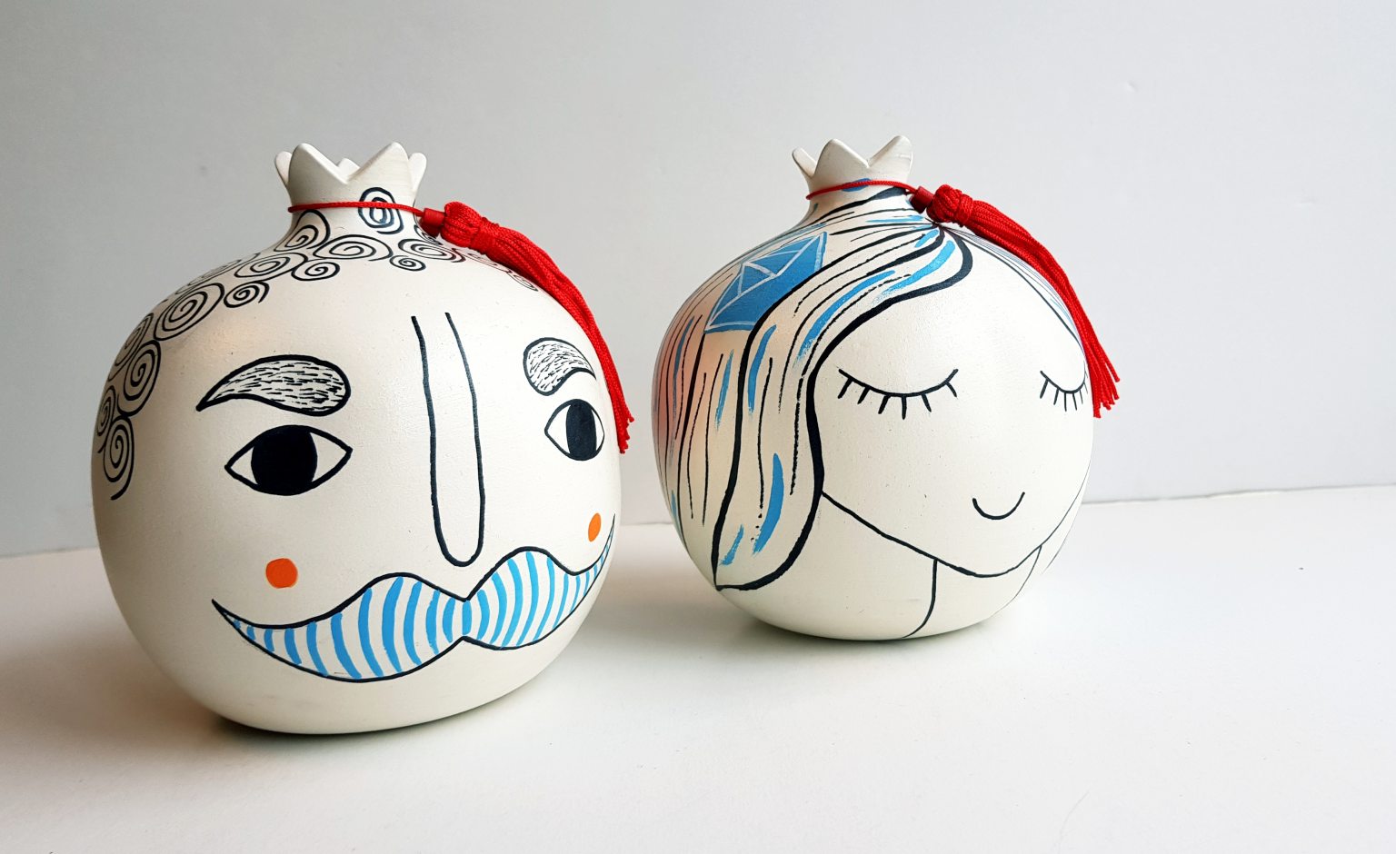 Large handmade pomegranate with a man