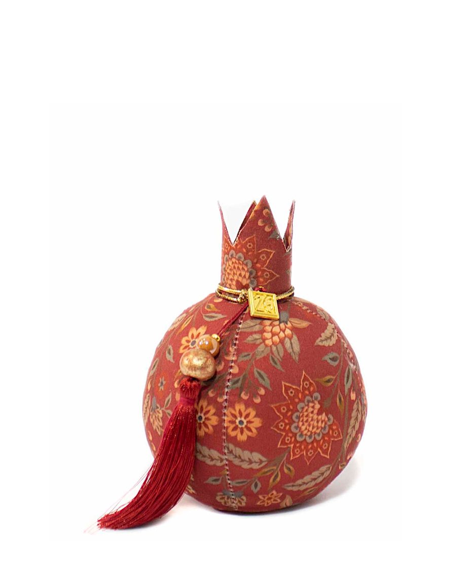 Κόκκινο υφασμάτινο ρόδι με λουλούδια