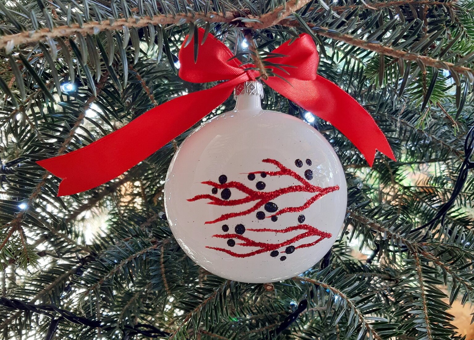 Large hand-blown bauble with red branches
