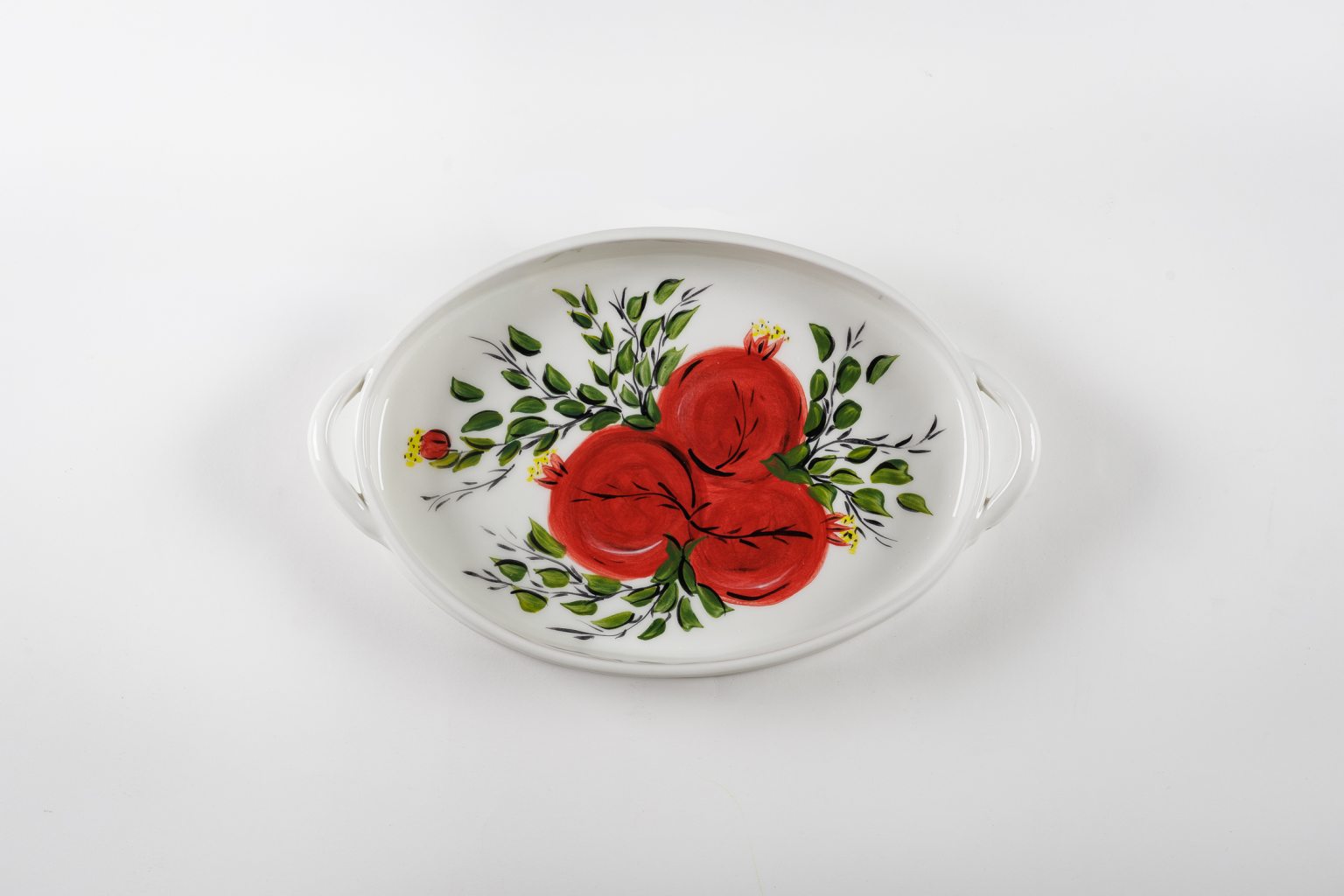 Handmade ceramic oval platter with pomegranates