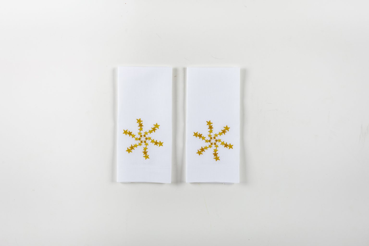 Set of two hand towels with gold stars