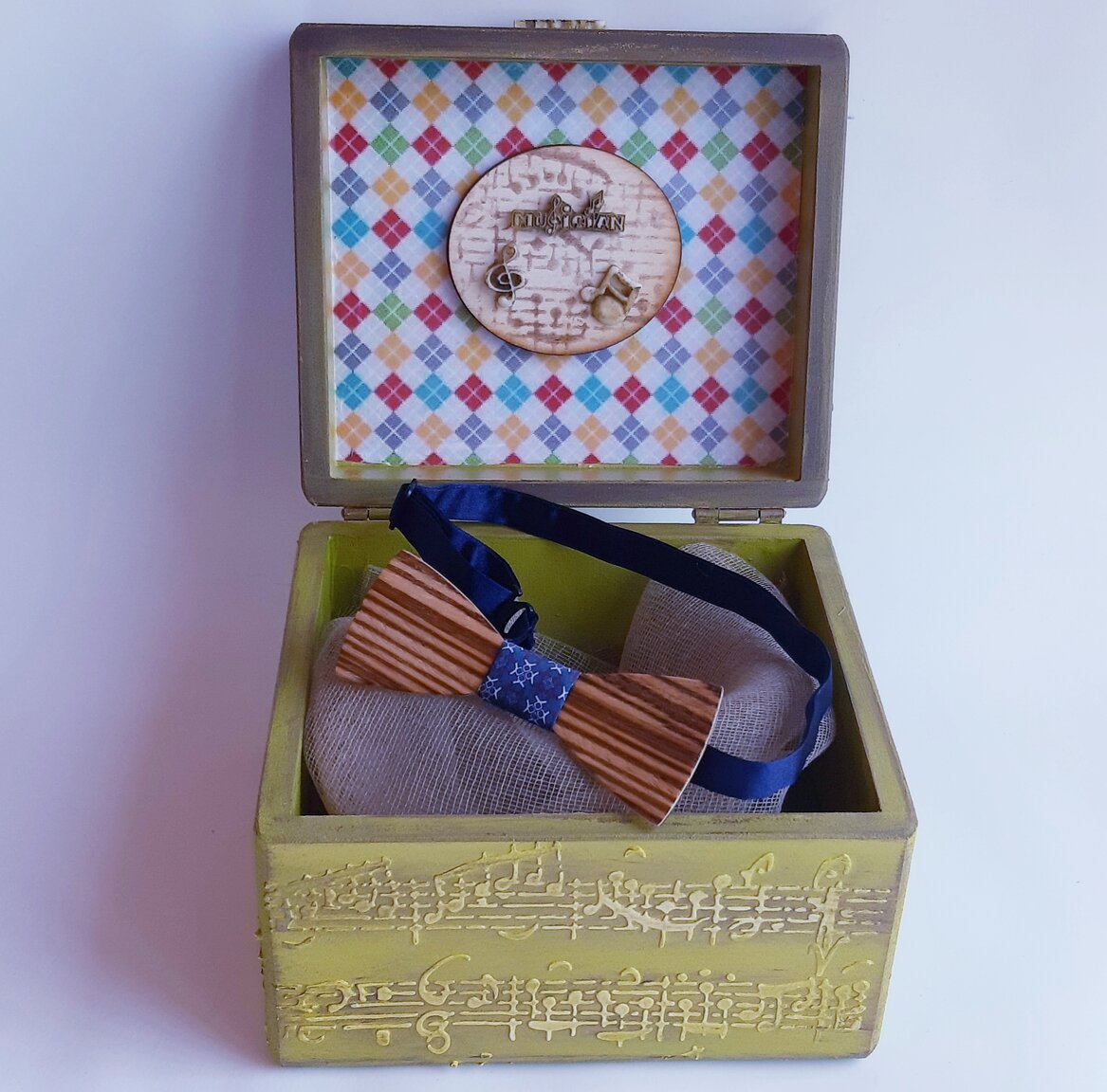 Wooden box with musical instruments