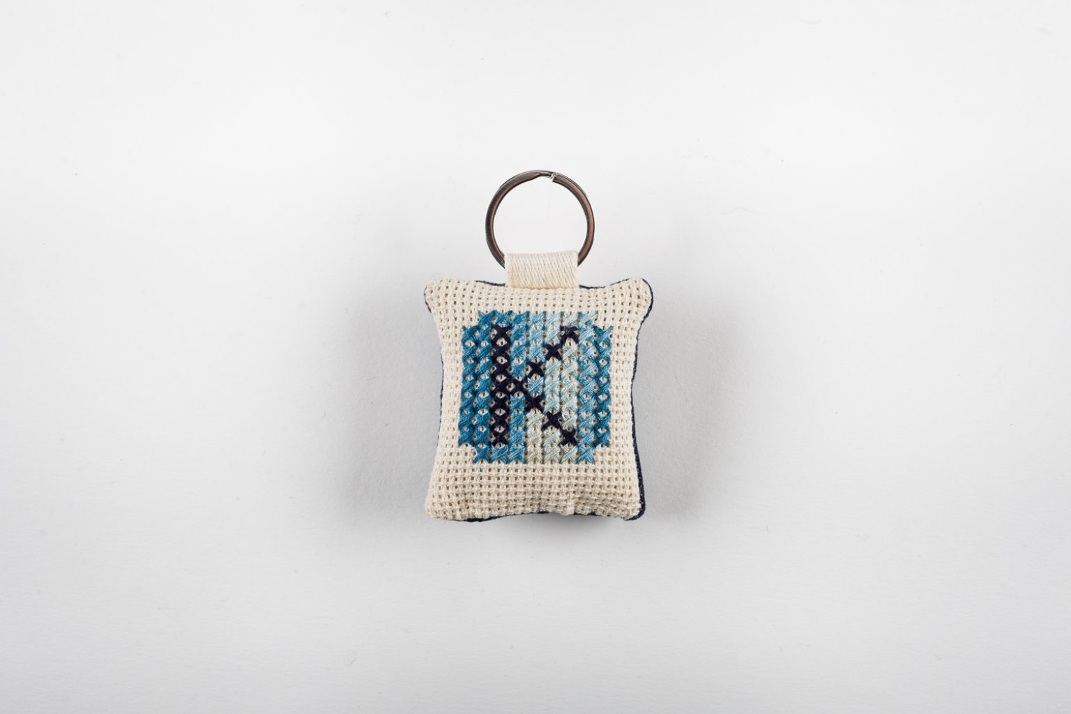 Hand-embroidered keyring with initial "Κ"