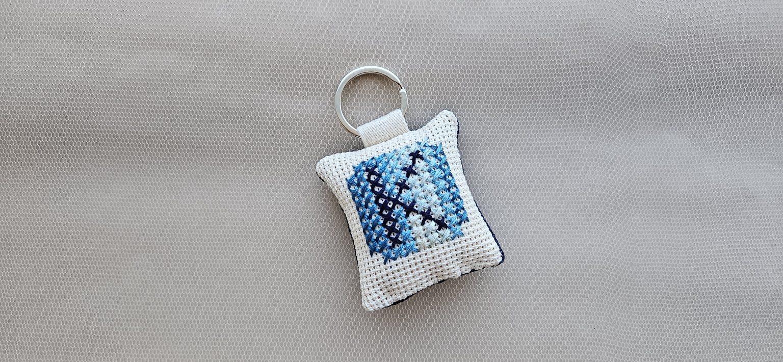 Hand-embroidered keyring with initial "Κ"