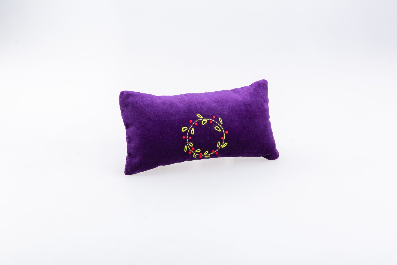 Purple hand-embroidered velvet cushion