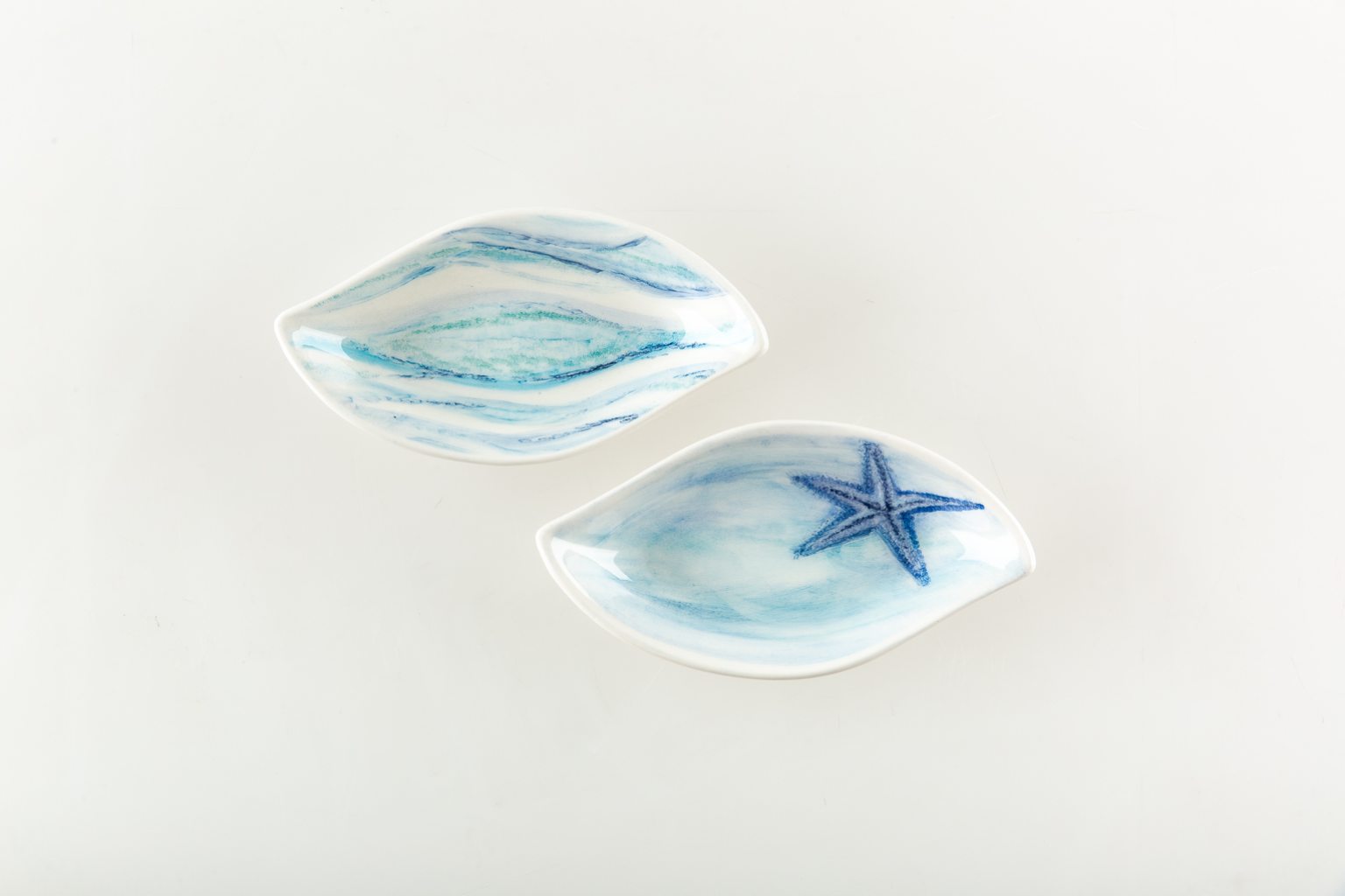 Candy and nut bowls with turquoise waves and starfish