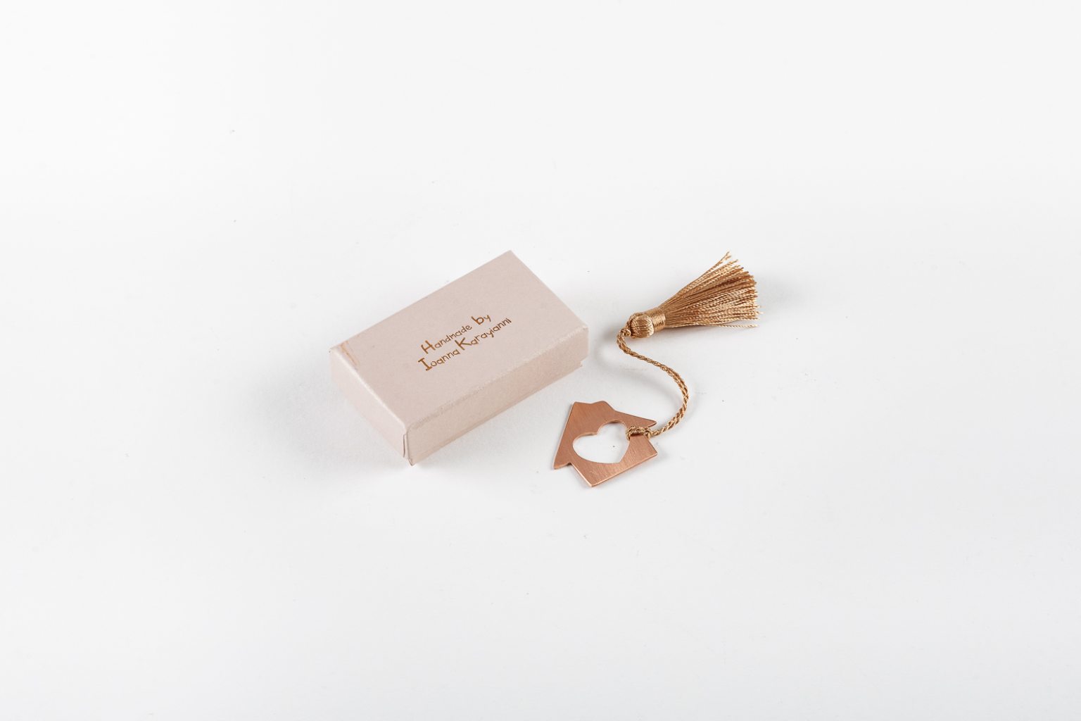 Petit porte bonheur en cuivre maison