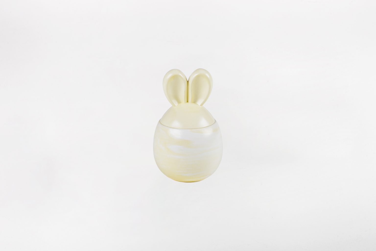 Bougie en céramique en forme de lapin, jaune et blanc