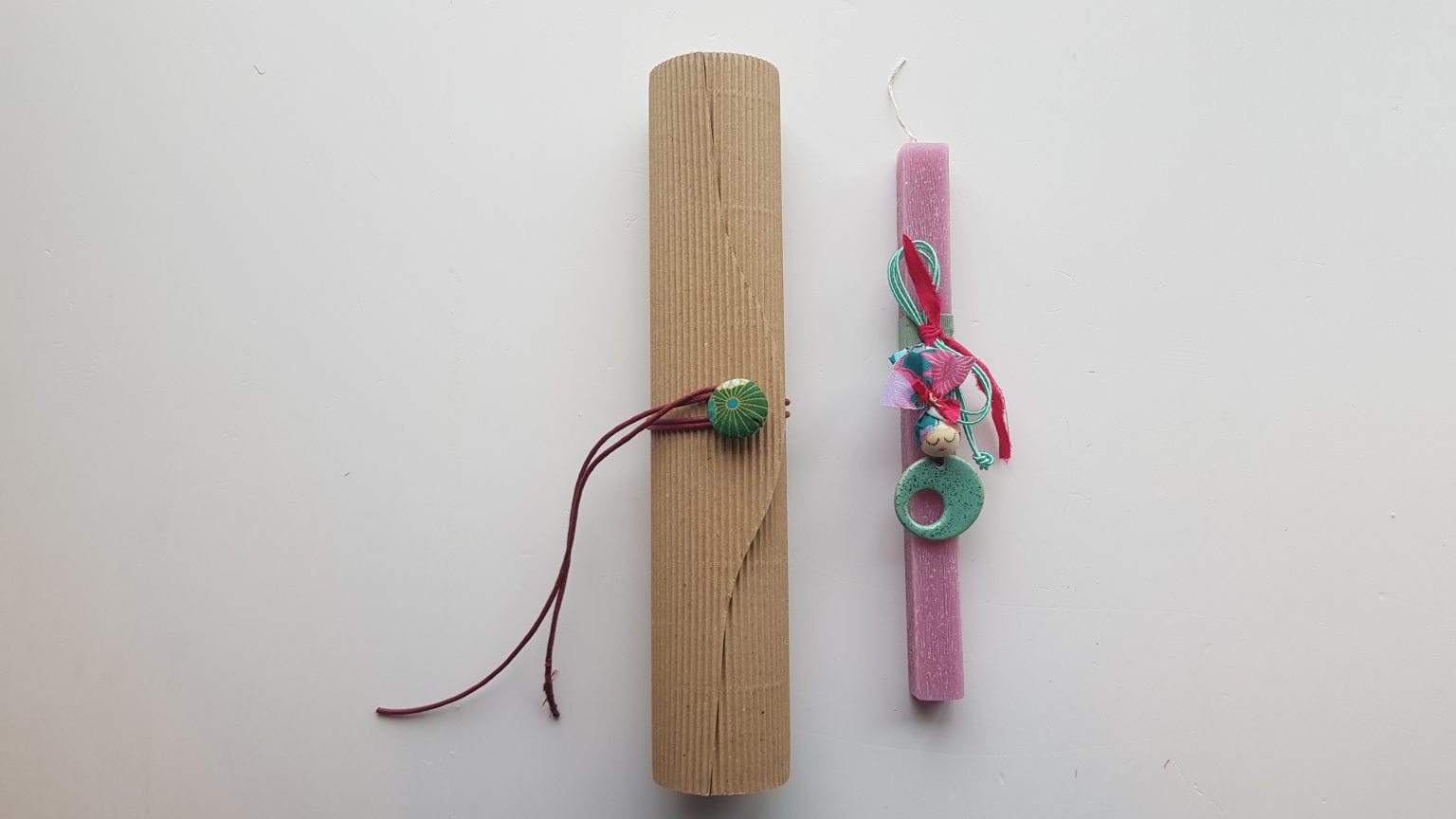 Handmade pink candle with turquoise pendant