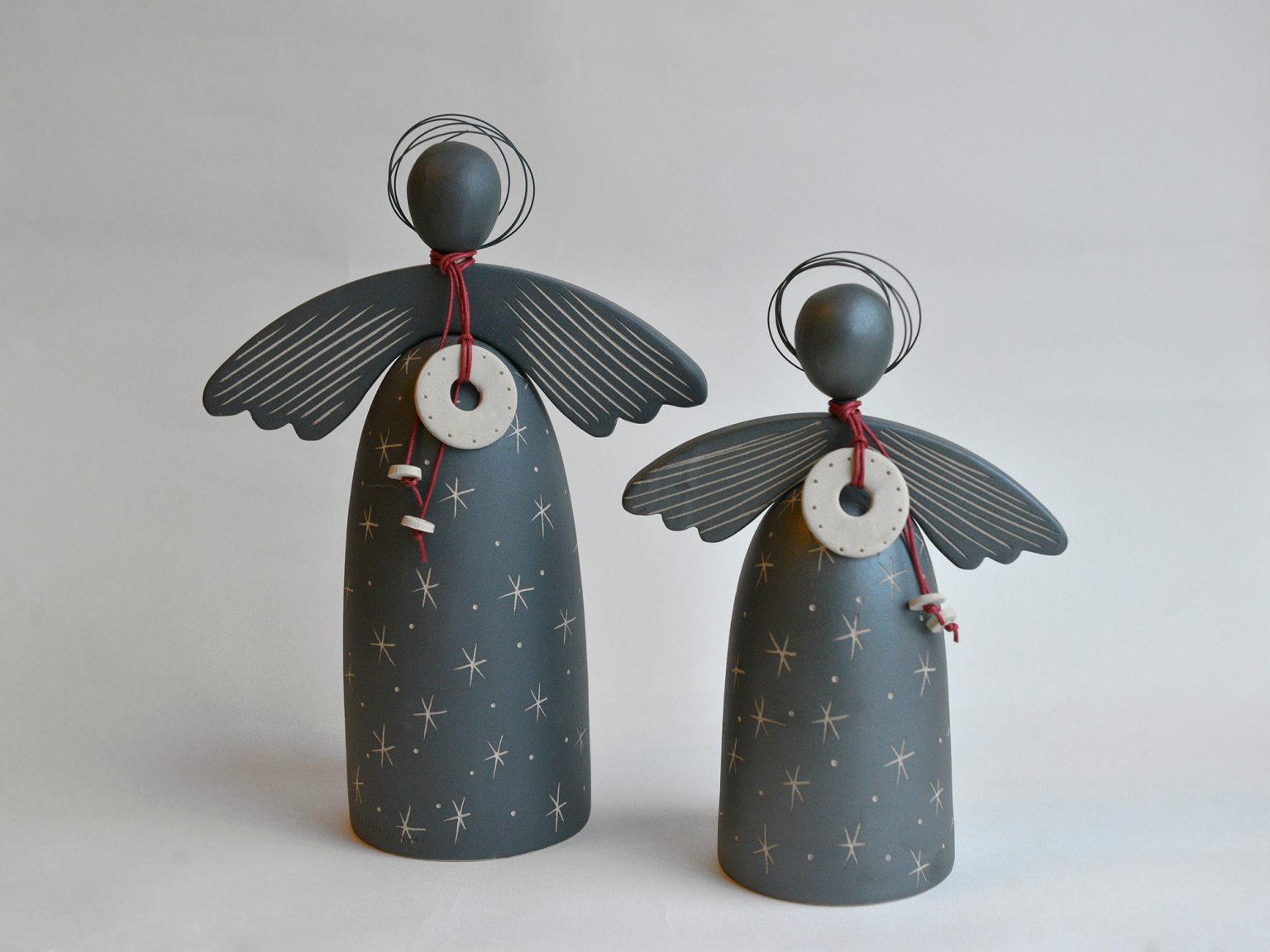 Two stoneware angels