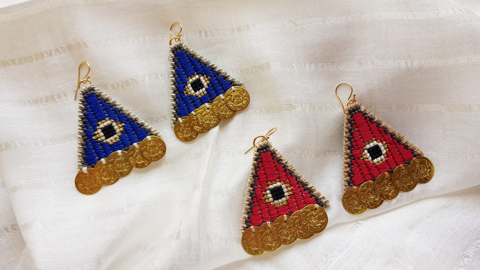 Red hand-stiched earrings with coins