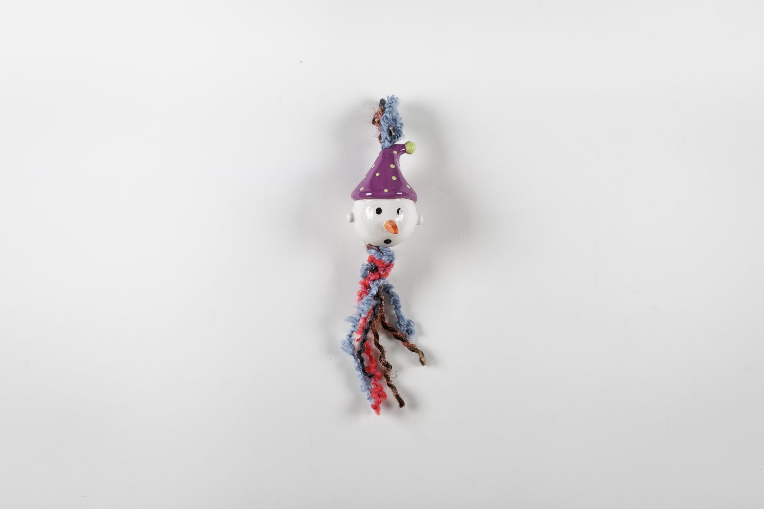 Handmade ceramic purple snowman ornament