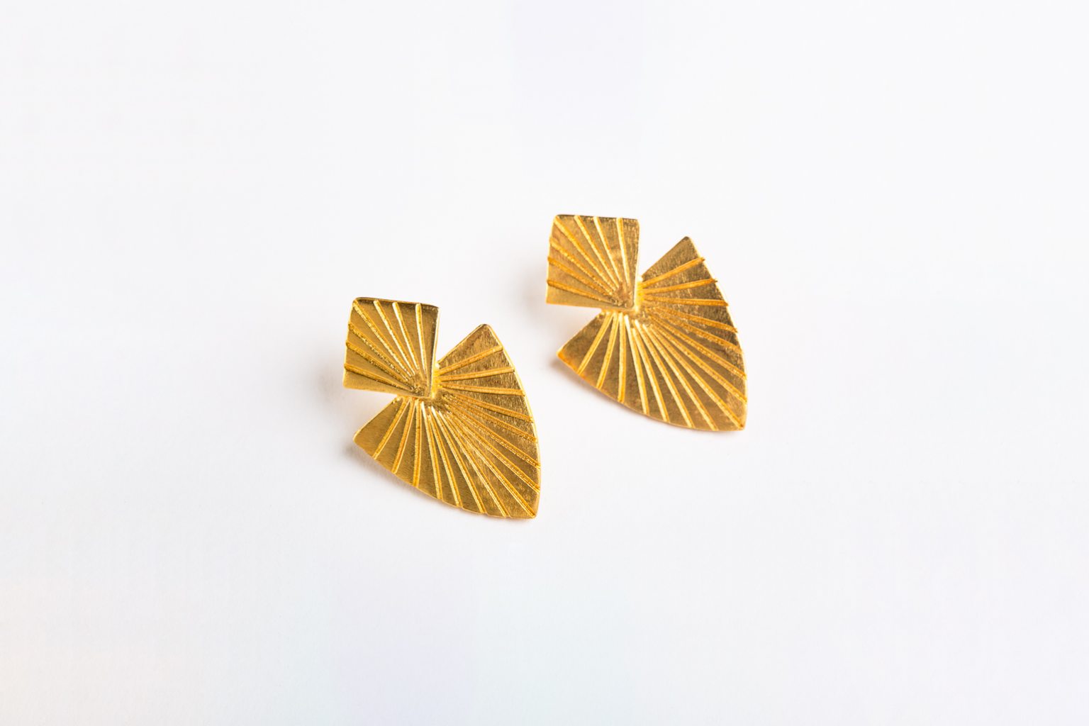 Large gold-plated earrings