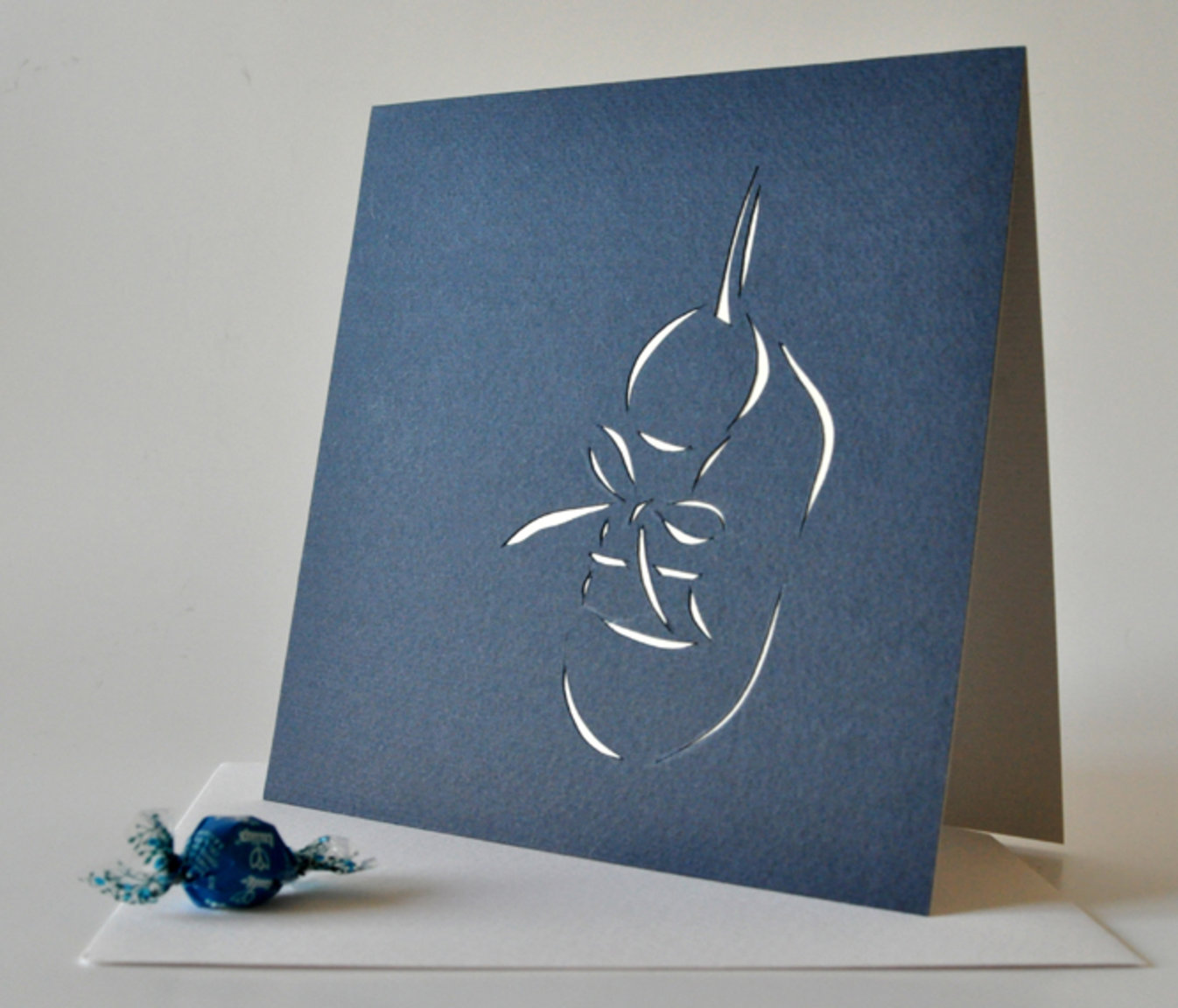 Card with blue shoe