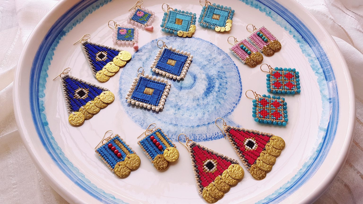 Pink hand-stitched earrings with turquoise "chaolites" & coins