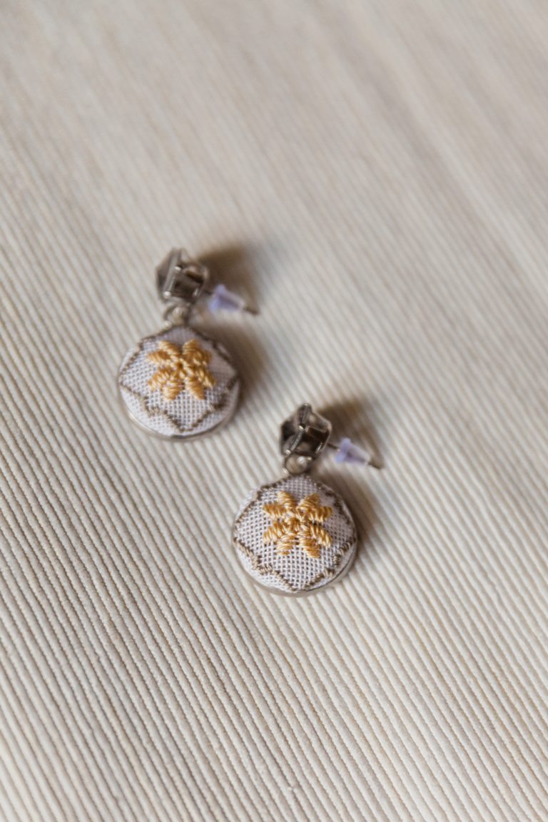 Golden hand-embroidered earrings