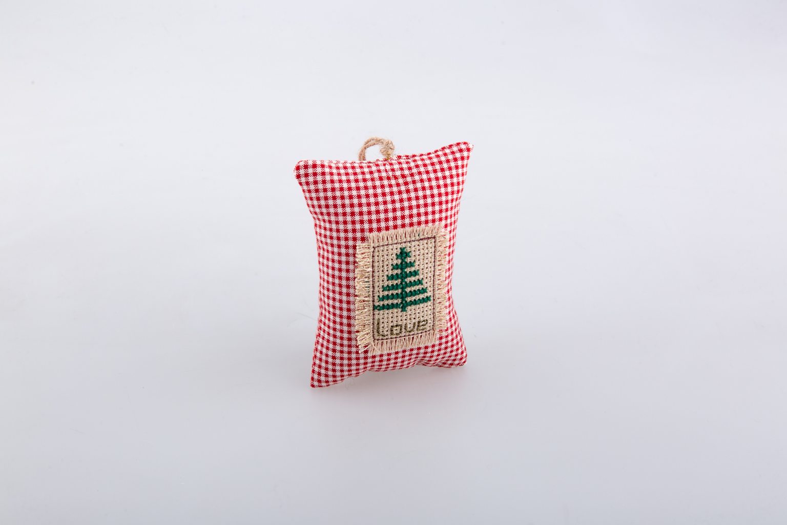 Hand-embroidered lucky charm with Christmas tree