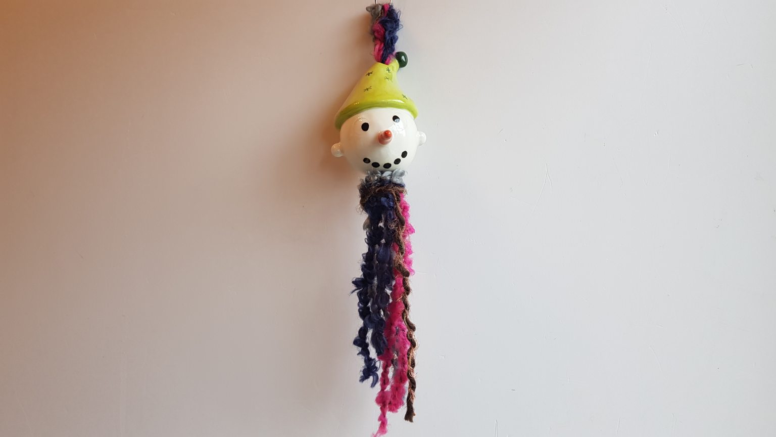 Handmade ceramic lime snowman ornament