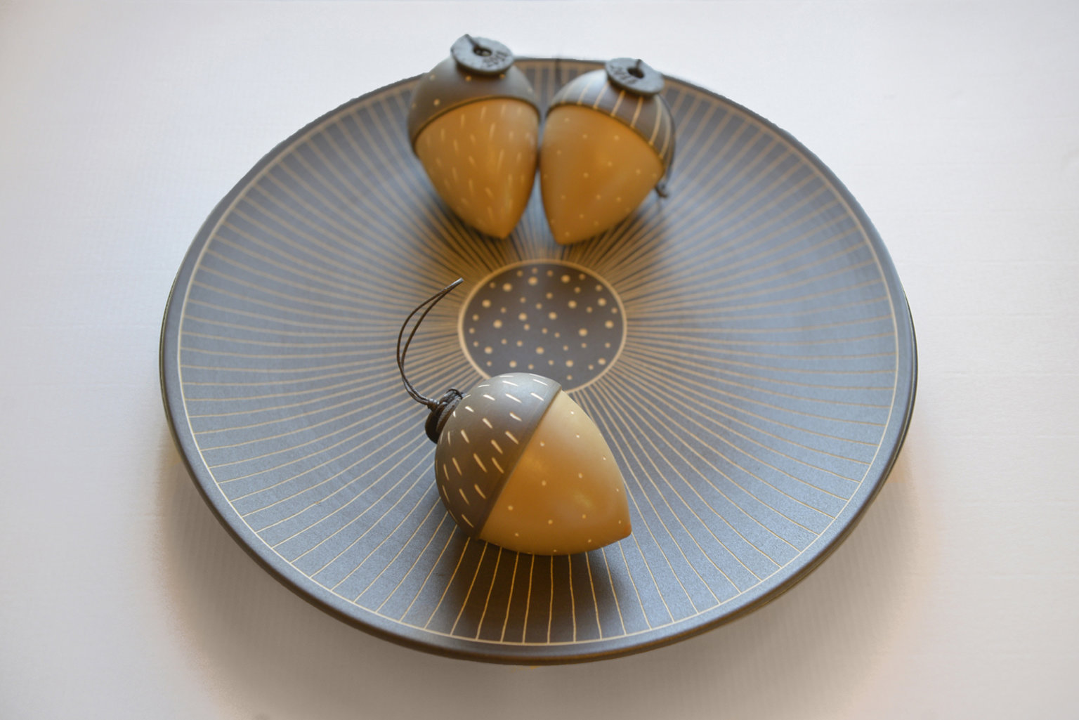 Large ceramic platter & three acorns