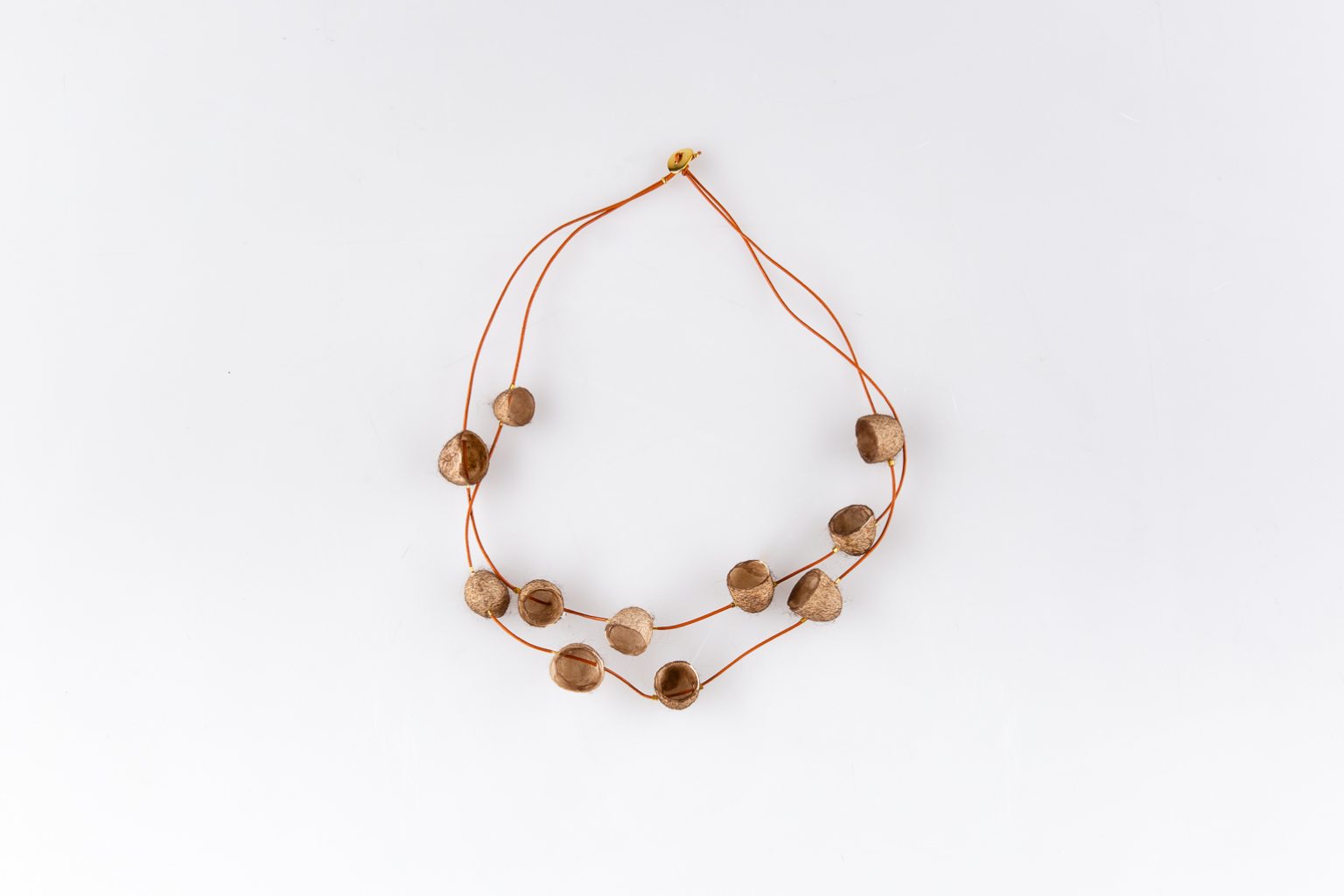 Necklace with beige silk cocoons "Planets"
