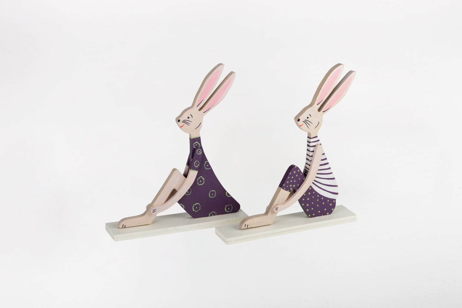 Handmade wooden sitting rabbits