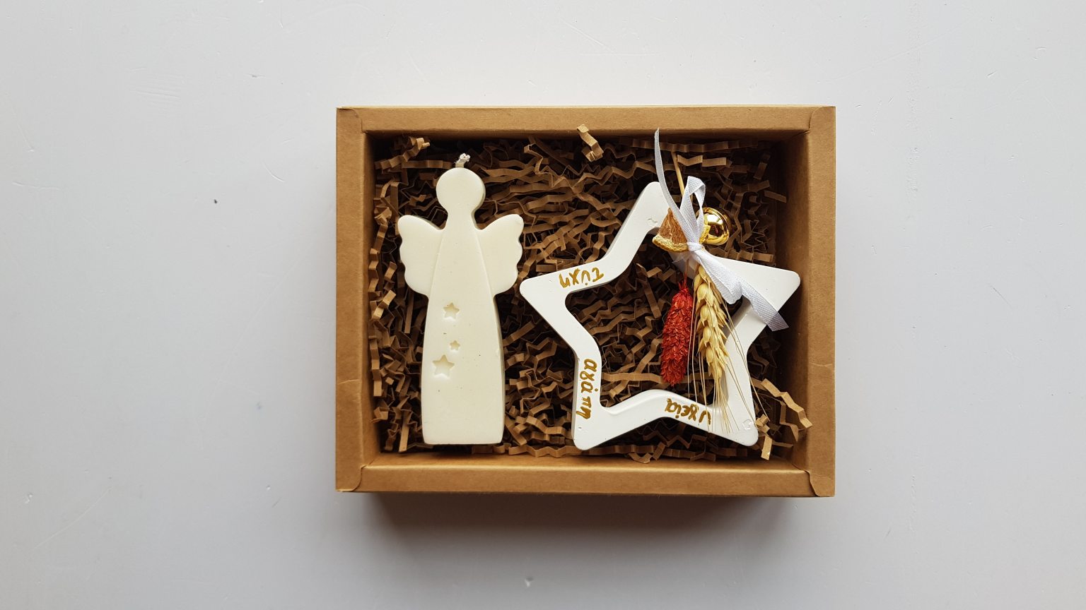 Box with angel candle & star charm