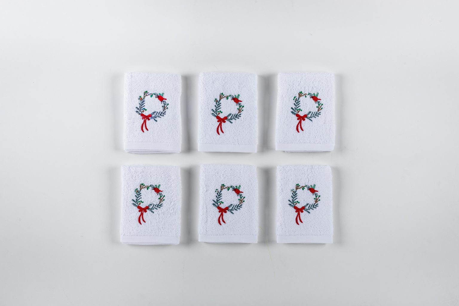 Set of six bath towels with crown & bird design