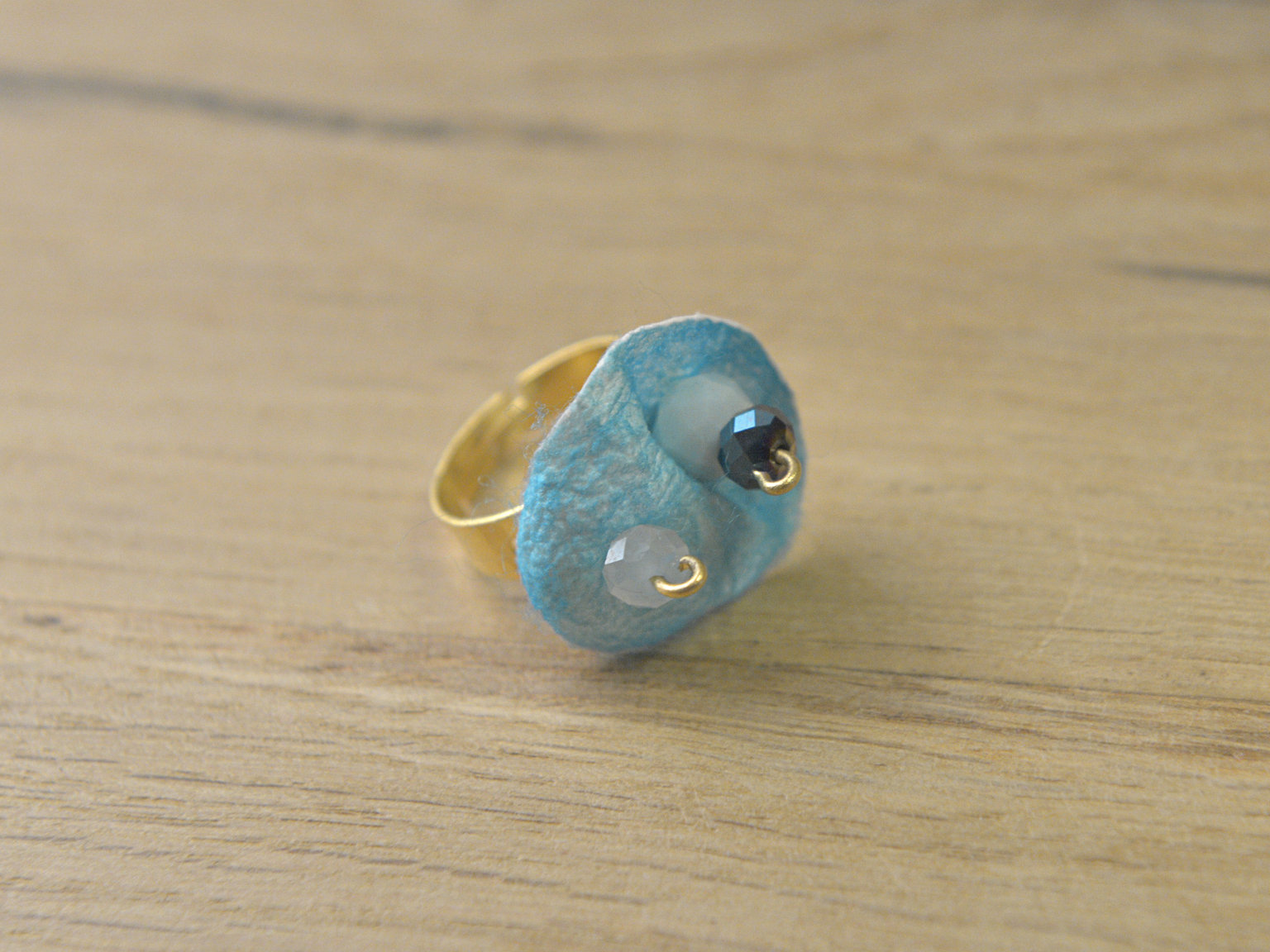 Ring with blue silk petal