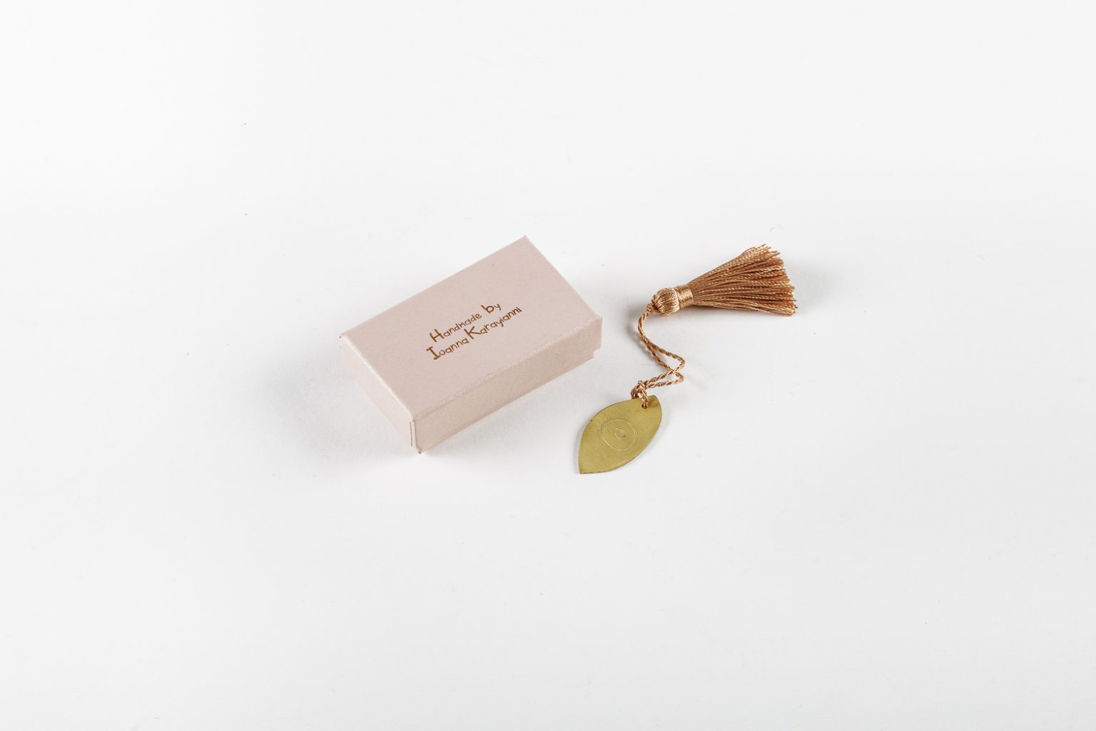 Mini brass lucky charm lucky eye