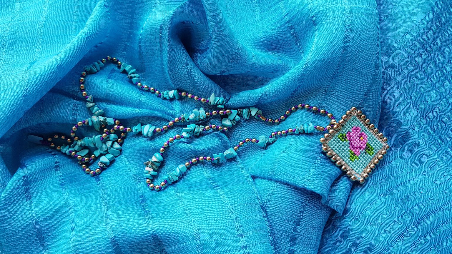 Τurquoise rosary necklace with hand-stitched rose