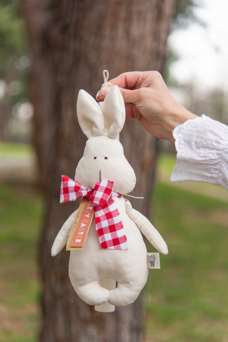 Handmade white bunny candle with red bow