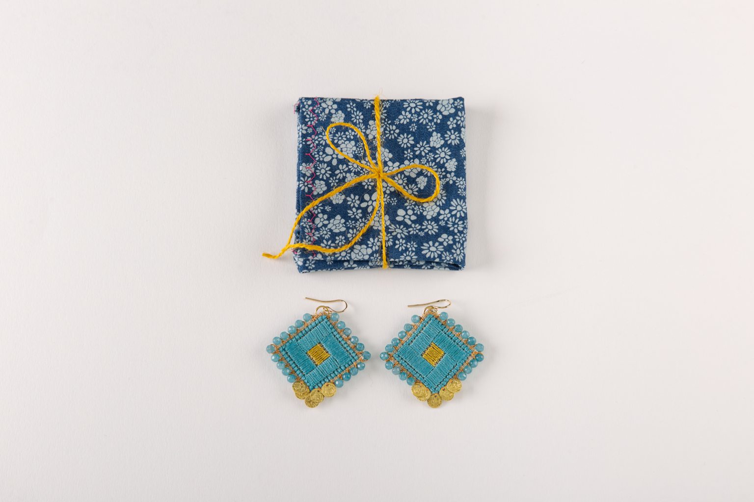 Turquoise hand-stitched earrings with agates & coins