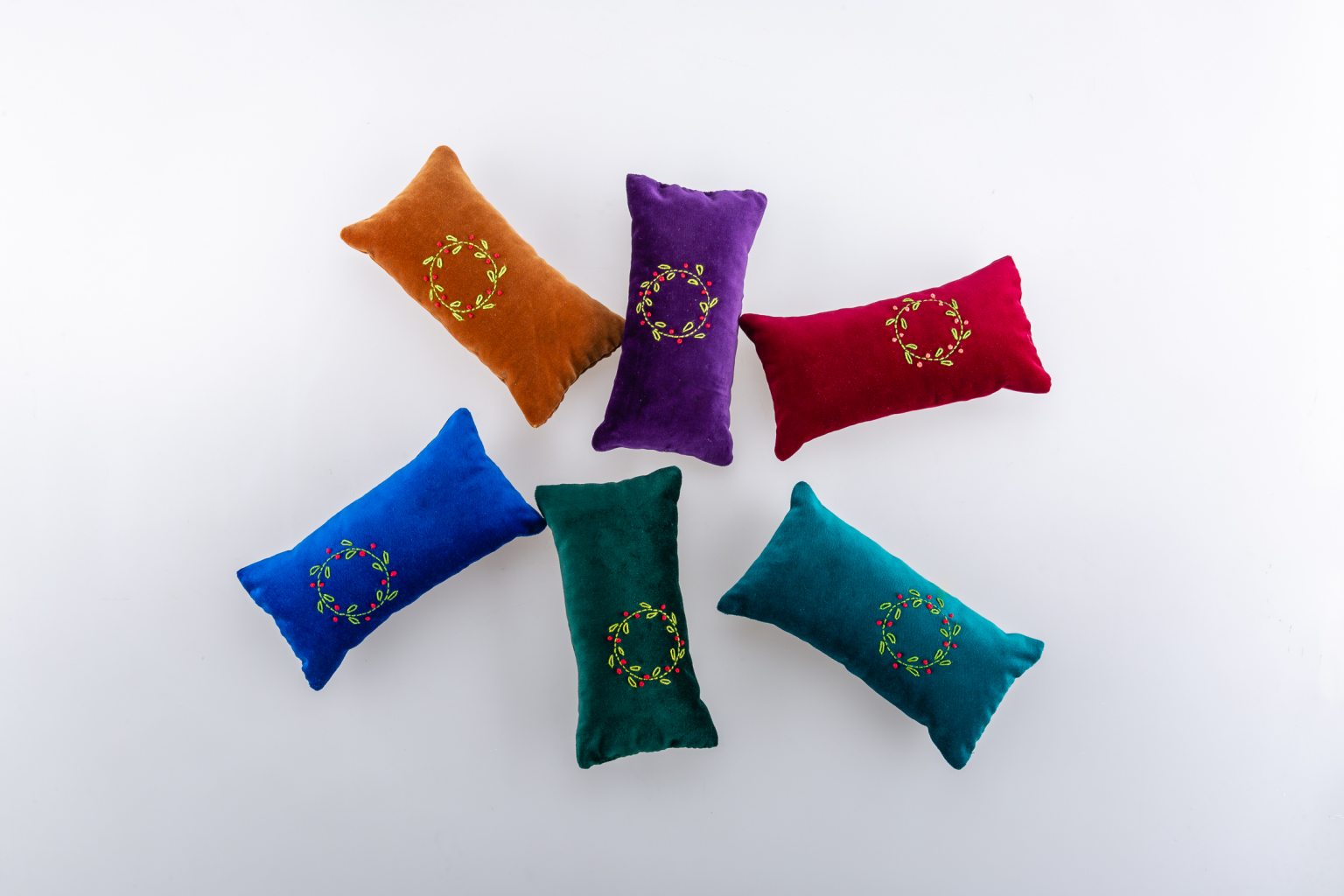 Purple hand-embroidered velvet cushion