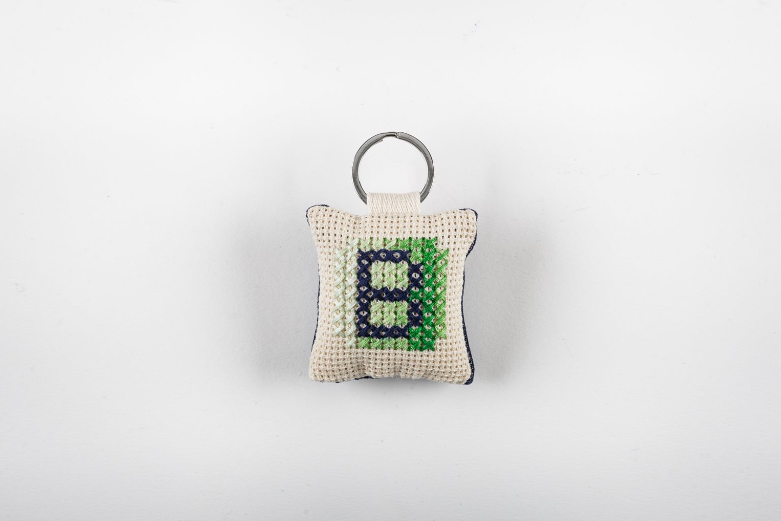 Hand-embroidered key-ring with initial "Β"