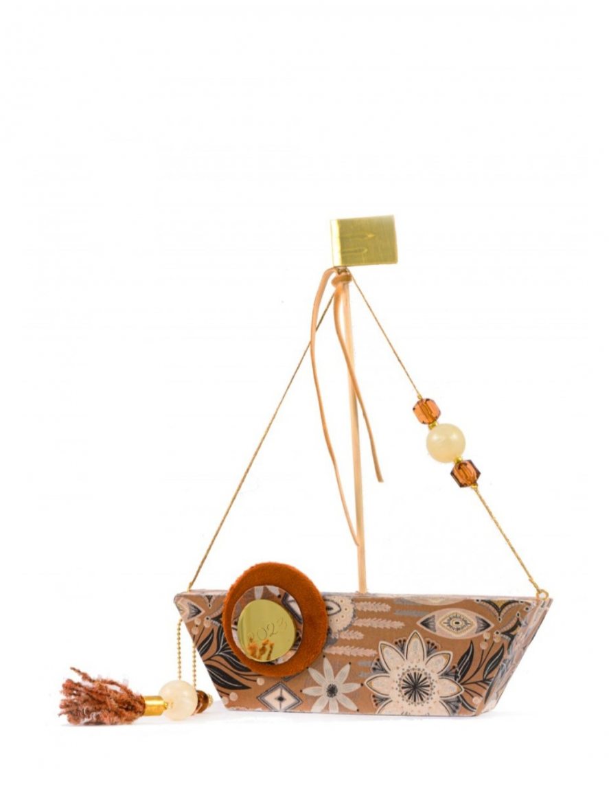 Handmade beige boat lucky charm 