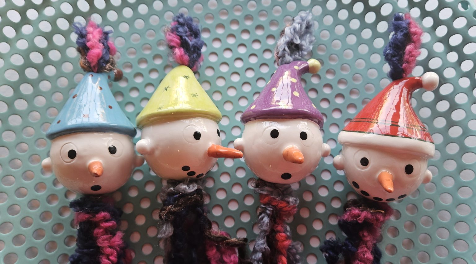 Handmade ceramic purple snowman ornament