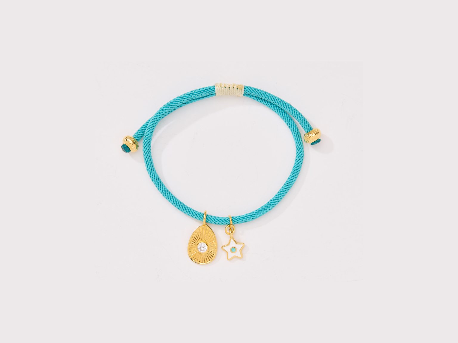 Bracelet with gold plated egg & star