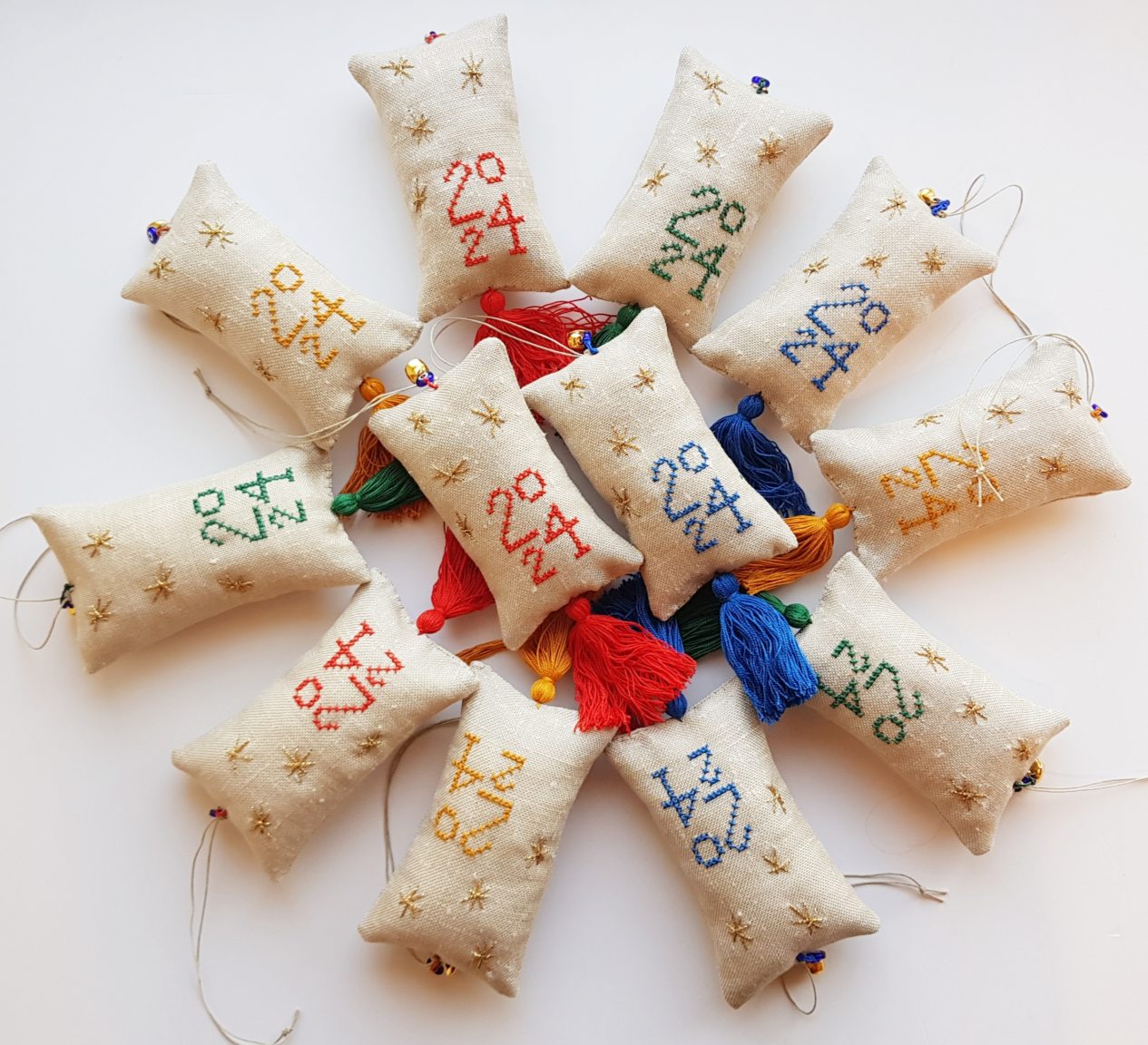 Hand-embroidered lucky-charm with "2024"
