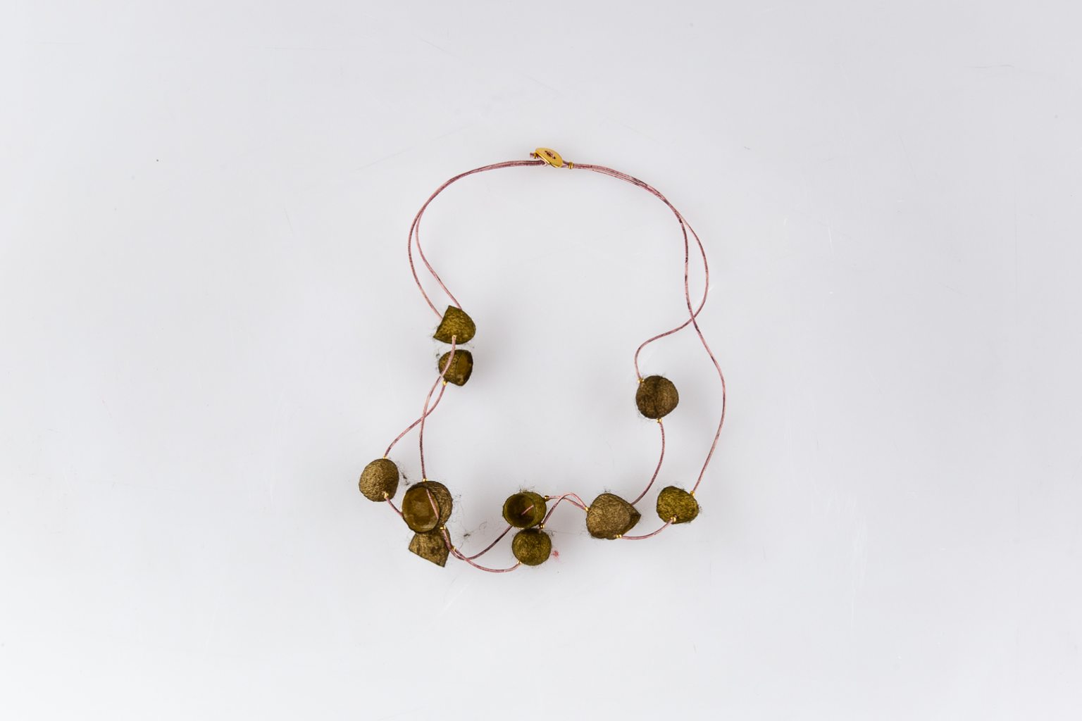 Necklace with olive-green coccoon "Planets"