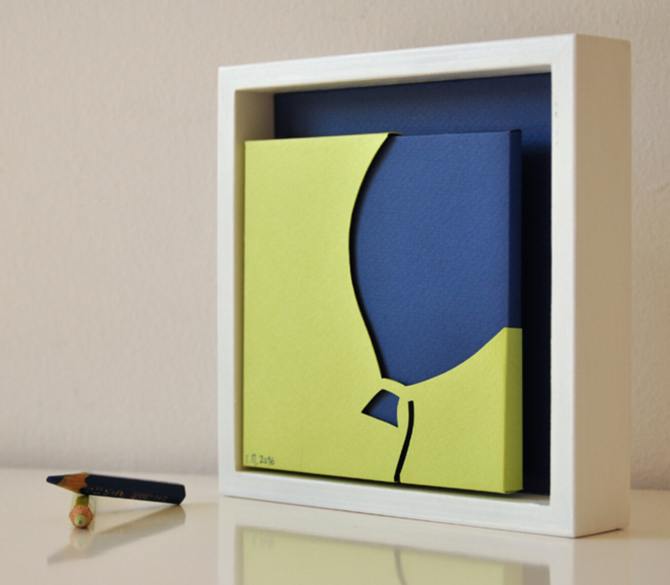 Wall frame with blue balloon