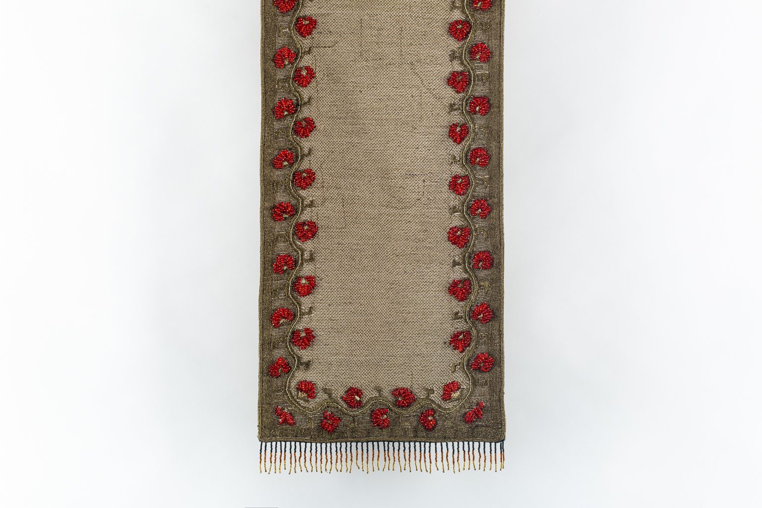 Hand-crafted runner with red embroidered flowers