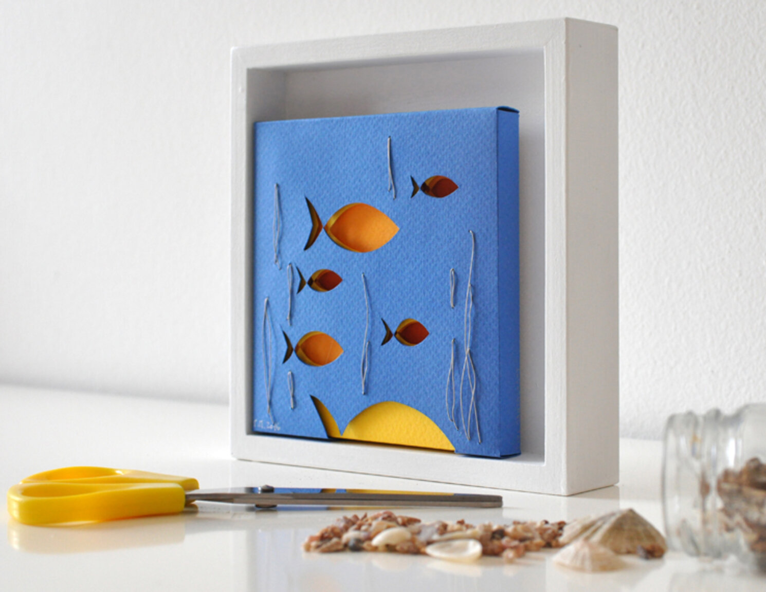 Wall frame with fish