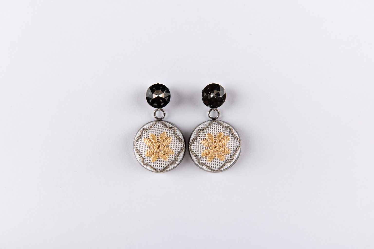 Golden hand-embroidered earrings