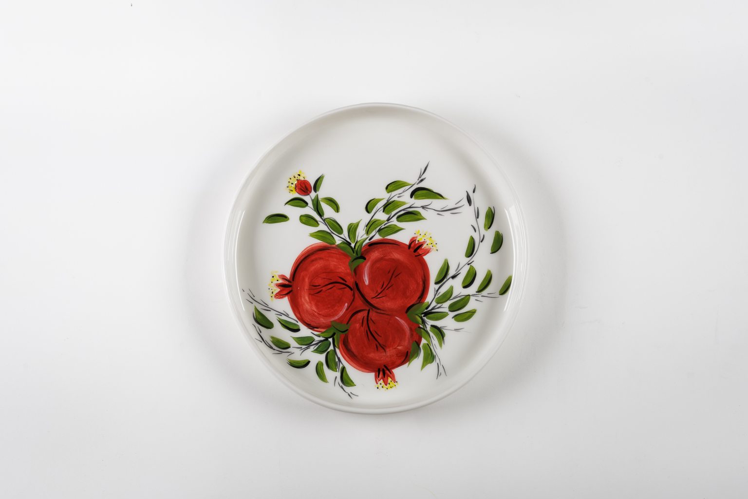 Handmade ceramic platter with pomegranates