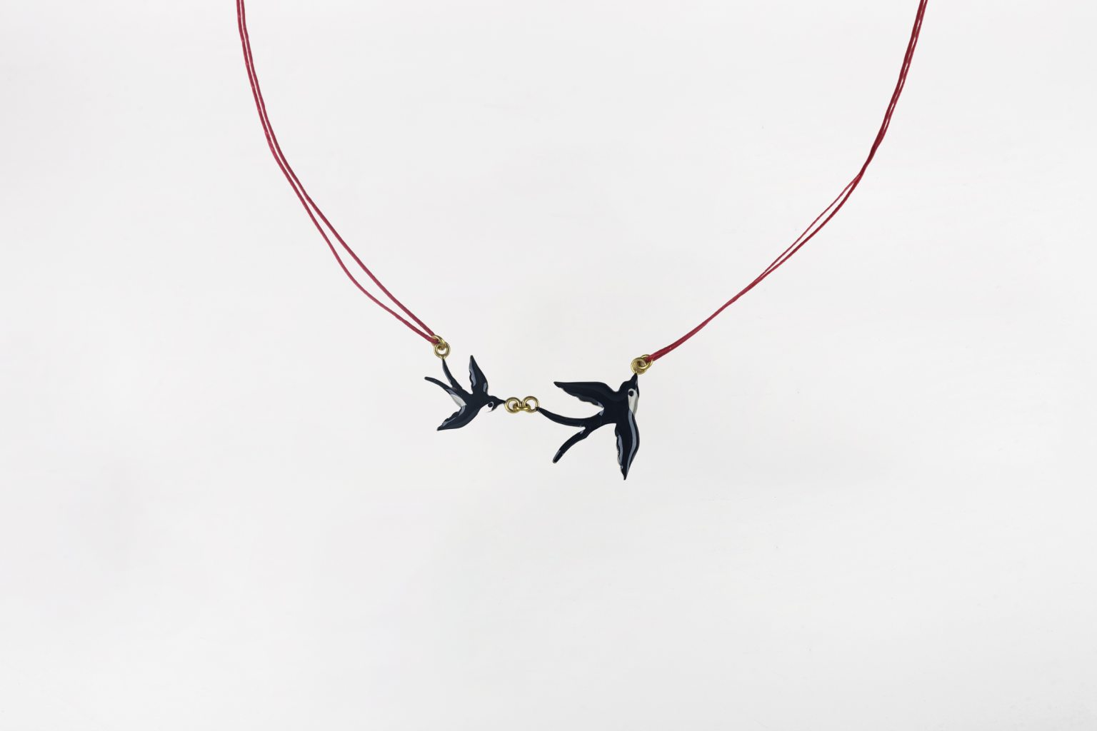 Necklace with swallows 