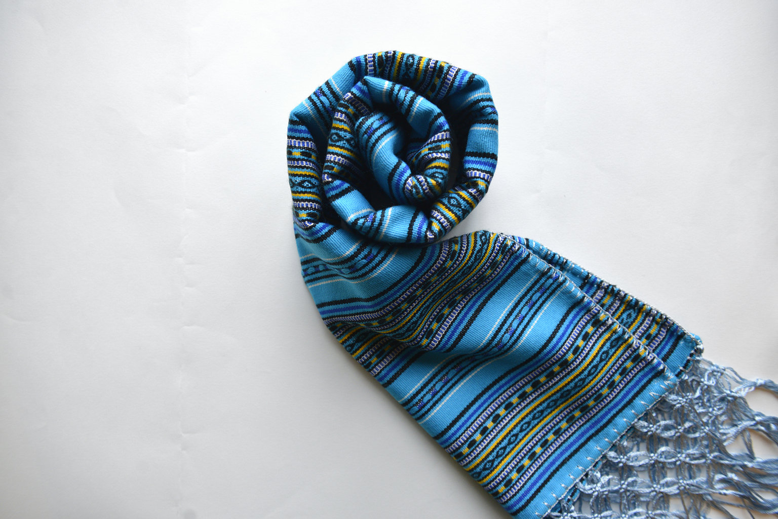 Light blue scarf with handmade silk fringe edge