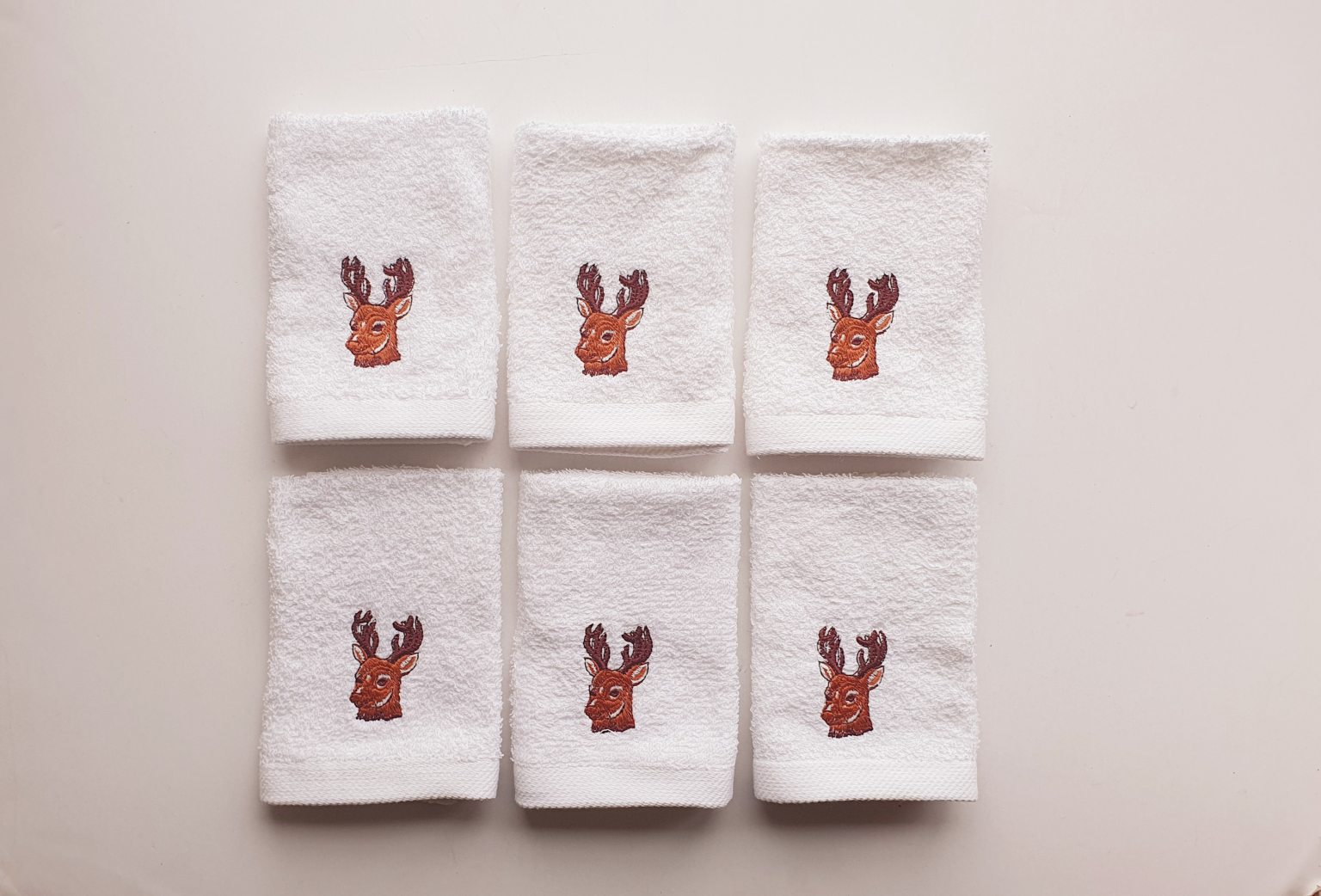 Set of six guest towels with deer