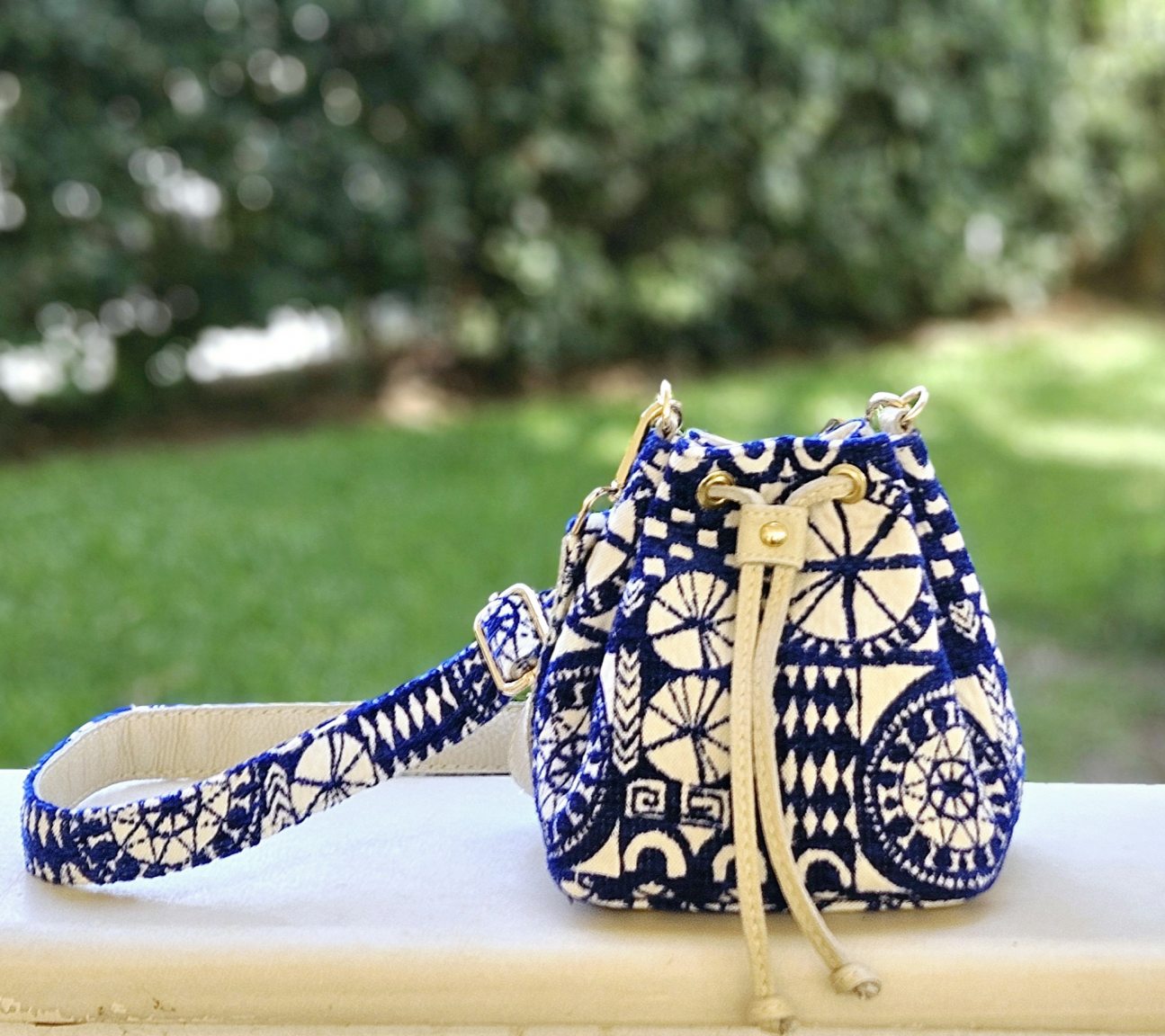 Small crossbody bucket bag “Delos”