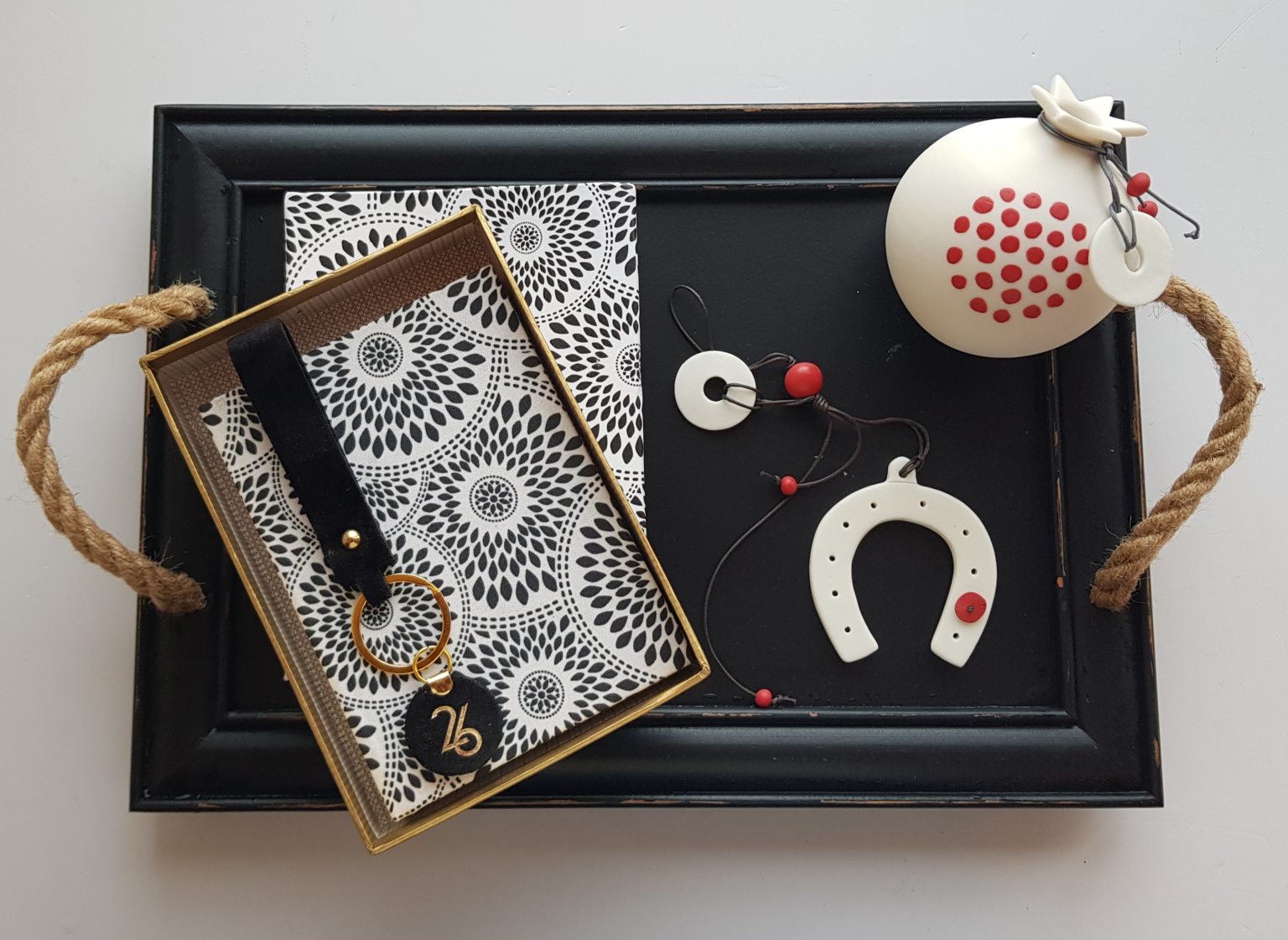 Gift set with hand-crafted diary, pomegranate and lucky charm 