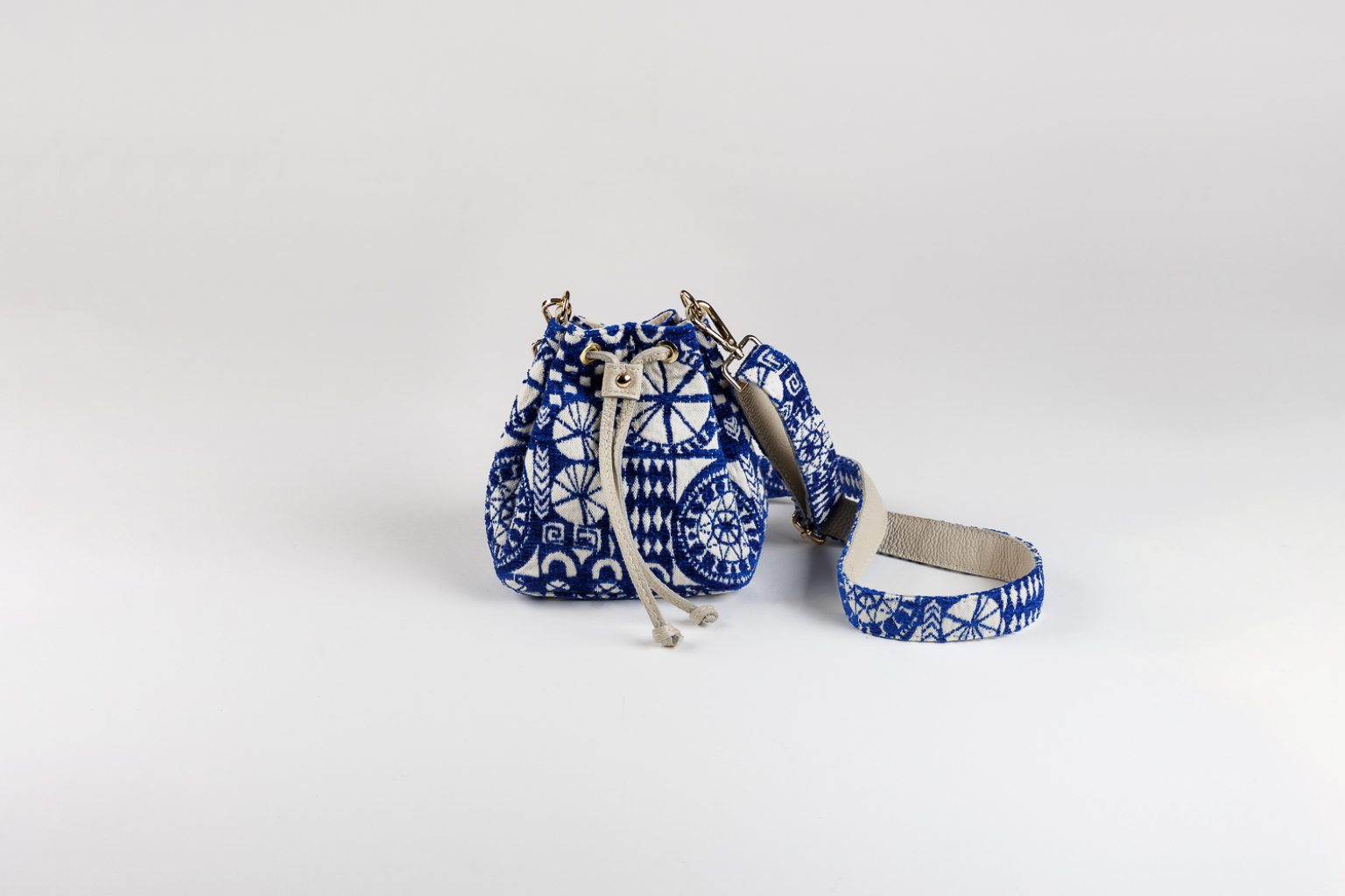 Small crossbody bucket bag “Delos”